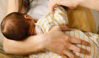 Mom breastfeeding her baby